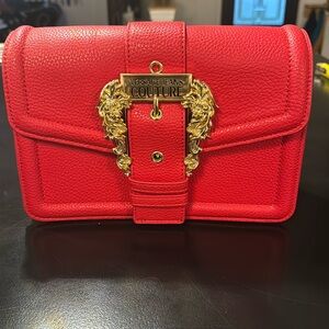Red Versace jeans couture bag